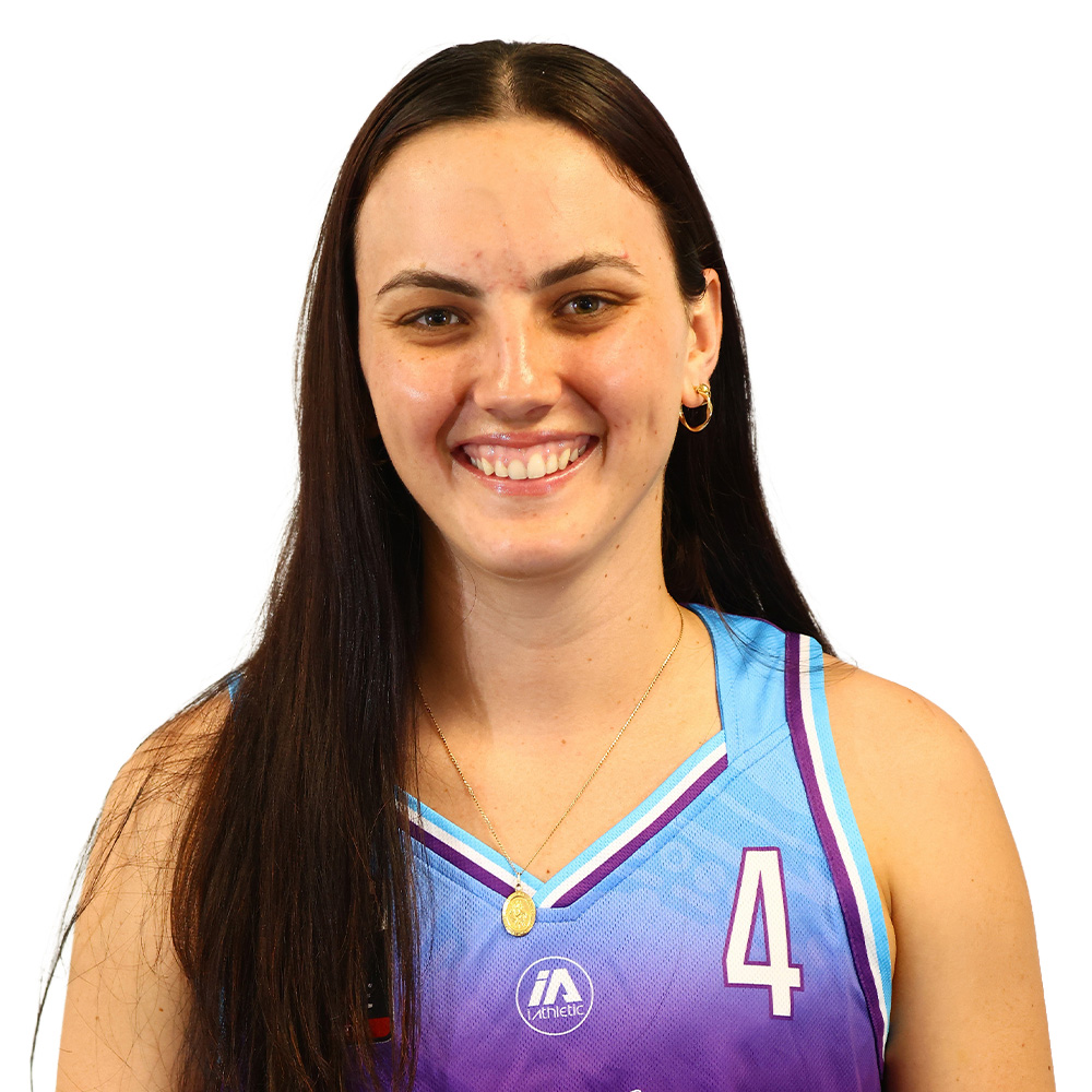 Young female basketball player smiling, wearing light blue to purple jersey with number 4 and gold necklace.