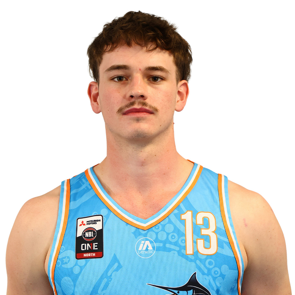 Portrait of a young man basketball player wearing a light blue jersey with the number 13, facing the camera.