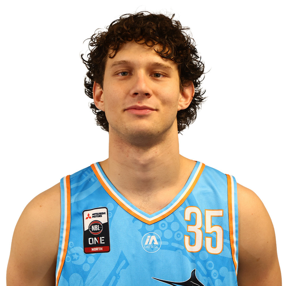 Portrait of a young male basketball player facing the camera, wearing a blue jersey with the number 35 and patches on the chest.