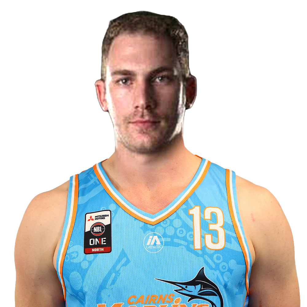 Portrait of a man in a light blue basketball jersey with the number 13 on the chest; facing the camera.