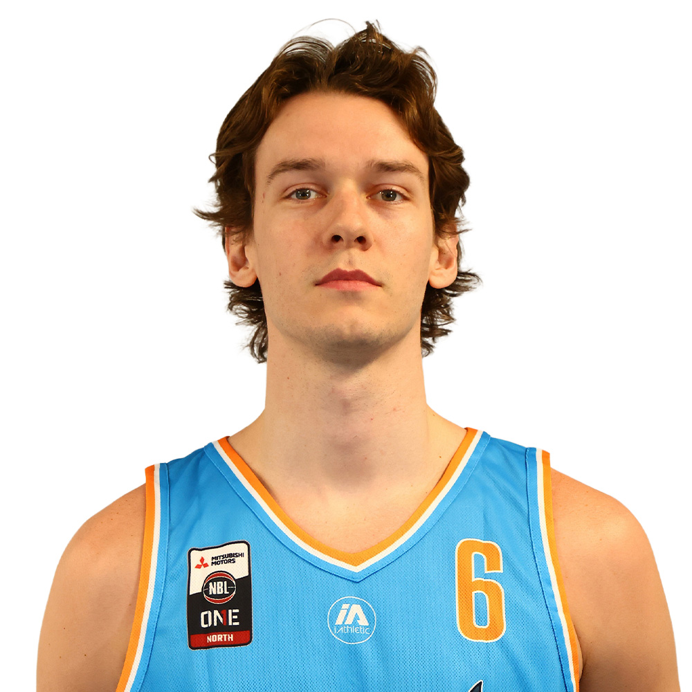 Portrait of a young man in a light blue basketball jersey with the number 6, against a white background.