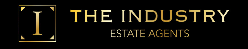 Logo for The Industry Estate Agents: black background, gold framed square with a large '1' and the text THE INDUSTRY ESTATE AGENTS in gold.