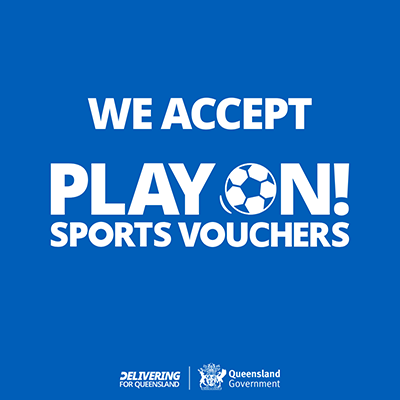 Blue poster reading 'WE ACCEPT PLAY ON! SPORTS VOUCHERS' with a soccer ball graphic, and small government logos at the bottom.